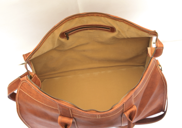 Screenshot 2025-07-24 at 8.20.11 AM Naked Leather Duffle Bag DB_NL1