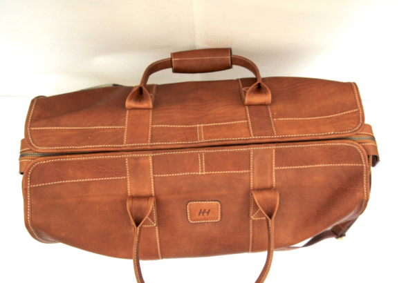 Screenshot 2025-07-24 at 8.21.52 AM Naked Leather Duffle Bag DB_NL1